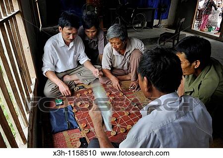 men playing game of strategy, Northern Vietnam, southeast asia View Large Photo Image Stock Image - men playing game of strategy, Northern Vietnam, southeast asia. Fotosearch