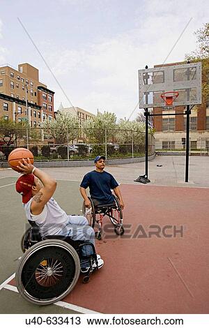 Men playing wheelchair basketball View Large Photo Image Stock Image - Men playing wheelchair basketball. Fotosearch