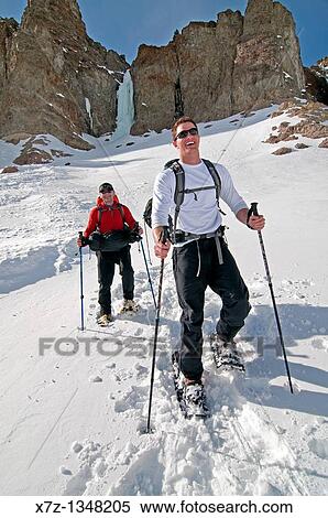 Men snowshoeing to go ice climbing near Silver Creek in the Boulder Mountains in central Idaho View Large Photo Image Stock Photography - Men snowshoeing to go ice climbing near Silver Creek in the Boulder Mountains in central Idaho. Fotosearch