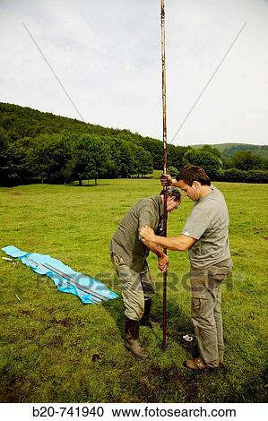 Men using Russian corer to sample peat, climate change research, Neiker-Tecnalia, Unit of Environment, Belate, Navarra, Spain View Large Photo Image Stock Image - Men using Russian corer to sample peat, climate change research, Neiker-Tecnalia, Unit of Environment, Belate, Navarra, Spain. Fotosearch