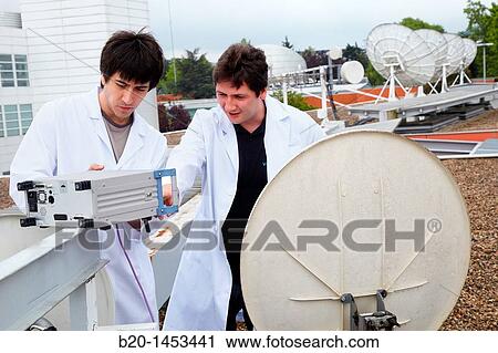 Stock Image - MER measurements, satellite dishes, digital TV and multimedia services, Vicomtech-IK4 Visual Interaction and Communication Technologies Centre, applied research centre for Interactive Computer Graphics and Multimedia. Fotosearch