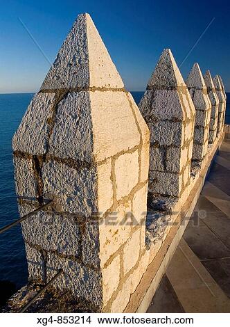 Picture - Merlons on the top of pope Benedict XIII? s castle (13th-14th century), Peiscola. Baix Maestrat, Castellon province, Comunidad Valenciana, Spain. Fotosearch