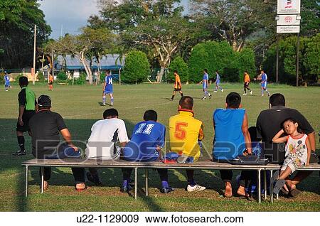 Mersing (Malaysia): soccer at the local soccer field View Large Photo Image Stock Photo - Mersing (Malaysia): soccer at the local soccer field. Fotosearch