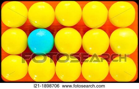Message Difference between an Individual and a group. Many yellow balls, a single ball blue. Orange background. View Large Photo Image Stock Photograph - Message Difference between an Individual and a group. Many yellow balls, a single ball blue. Orange background.. Fotosearch