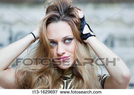 Messing hair young woman portrait View Large Photo Image Stock Photo - Messing hair young woman portrait. Fotosearch