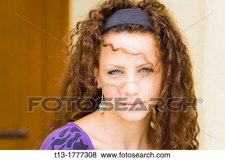 Messy hair before her face girl portrait View Large Photo Image Stock Photo - Messy hair before her face girl portrait. Fotosearch