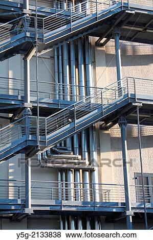 metal steel pipes on the side of a cinema building in rome italy View Large Photo Image Stock Photo - metal steel pipes on the side of a cinema building in rome italy. Fotosearch