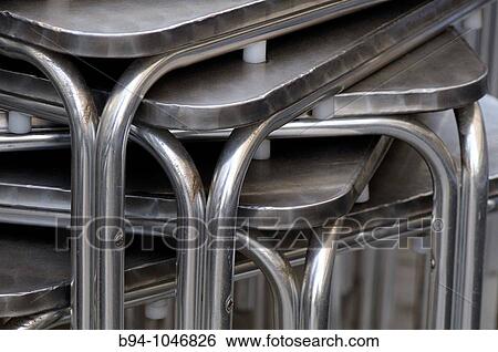 Stock Photograph - Metal tables. Fotosearch