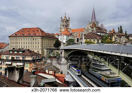 Metro railway on St-Martin bridge under the Bessieres bridge with the Cathedral of Notre Dame in background, Lausanne, Canton of Vaud, Switzerland, Europe. View Large Photo Image Stock Photograph - Metro railway on St-Martin bridge under the Bessieres bridge with the Cathedral of Notre Dame in background, Lausanne, Canton of Vaud, Switzerland, Europe.. Fotosearch