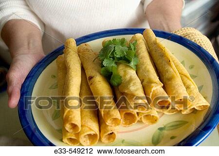 Mexican cuisine - Plate of taquitos. View Large Photo Image Stock Image - Mexican cuisine - Plate of taquitos.. Fotosearch