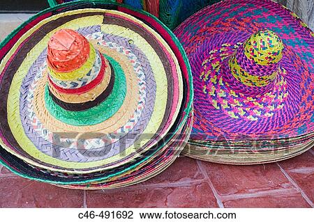Mexican hats at Mexican market, Cancun. Yucatan Peninsula, Mexico View Large Photo Image Stock Image - Mexican hats at Mexican market, Cancun. Yucatan Peninsula, Mexico. Fotosearch