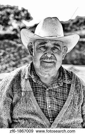 Mexican man with cowboy hat portrait in Oaxaca Mexico View Large Photo Image Stock Photo - Mexican man with cowboy hat portrait in Oaxaca Mexico. Fotosearch
