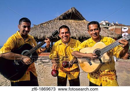 Stock Image - Mexican musicians and lively fun in tourist town of Puerto Vallarta Mexico. Fotosearch