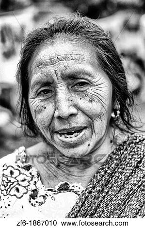 Stock Image - Mexican woman with traditional dress portrait in Oaxaca Mexico. Fotosearch