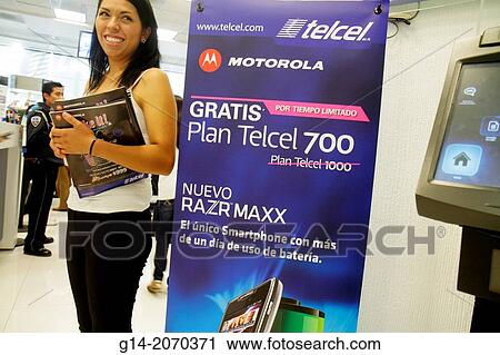 Mexico, Mexico City, DF, D. F., Distrito Federal, Paseo de la Reforma, Reforma 222, mall, shopping, center, centre, store, business, technology, poster, sign, Spanish, Motorola, Razor, smartphone, mobile phone service, Hispanic, woman, hostess, smiling,. View Large Photo Image Stock Image - Mexico, Mexico City, DF, D. F., Distrito Federal, Paseo de la Reforma, Reforma 222, mall, shopping, center, centre, store, business, technology, poster, sign, Spanish, Motorola, Razor, smartphone, mobile phone service, Hispanic, woman, hostess, smiling,.. Fotosearch