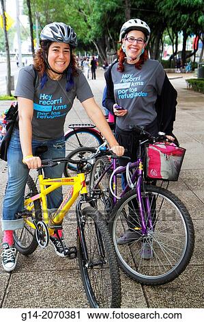 Stock Image - Mexico, Mexico City, DF, D. F., Distrito Federal, Paseo de la Reforma, Cicloton, urban bicycling program, Sunday street closure, bicycle, bike, community event, Hispanic, woman, refugee benefit race, participant, smiling,.. Fotosearch