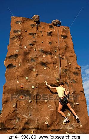 MEXICO, RIVIERA MAYA NEAR CANCUN, AVENTURA SPA PALACE RESORT, WOMAN ON CLIMBING WALL. View Large Photo Image Stock Image - MEXICO, RIVIERA MAYA NEAR CANCUN, AVENTURA SPA PALACE RESORT, WOMAN ON CLIMBING WALL.. Fotosearch