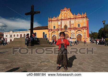 Mexico, San Cristobal las Casas, Mayan girl in front of Cathedral (MR) View Large Photo Image Picture - Mexico, San Cristobal las Casas, Mayan girl in front of Cathedral (MR). Fotosearch