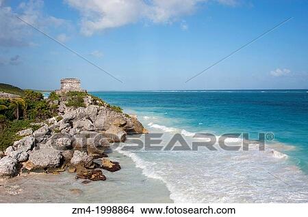 MEXICO, YUCATAN PENINSULA, NEAR CANCUN, RIVIERA MAYA, MAYA RUINS OF TULUM, VIEW OF TEMPLO DIOS DEL VIENTO (GOD OF WINDS TEMPLE), BEACH IS A PROTECTED TURTLE BREEDING AREA. View Large Photo Image Picture - MEXICO, YUCATAN PENINSULA, NEAR CANCUN, RIVIERA MAYA, MAYA RUINS OF TULUM, VIEW OF TEMPLO DIOS DEL VIENTO (GOD OF WINDS TEMPLE), BEACH IS A PROTECTED TURTLE BREEDING AREA.. Fotosearch