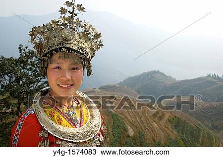 Stock Image - Miao ethnic minority girl, Longji terraced fields, Longsheng, Guangxi, S China. Fotosearch