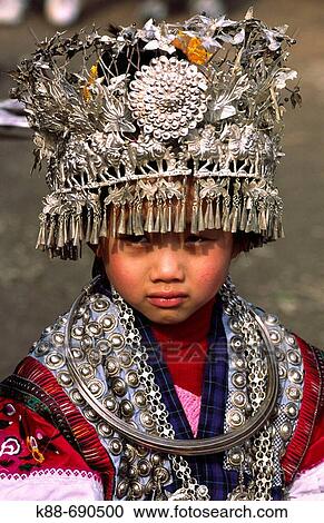 Miao girl with silver headdress during the Lusheng festival near Kaili, Guizhou, China View Large Photo Image Stock Image - Miao girl with silver headdress during the Lusheng festival near Kaili, Guizhou, China. Fotosearch