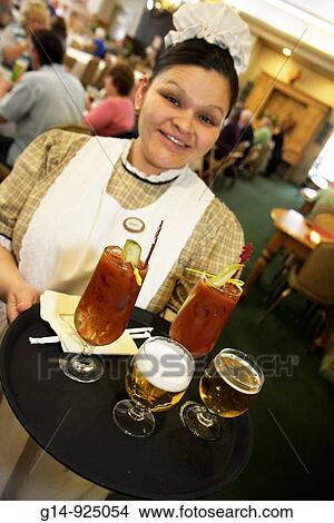 Michigan, Frankenmuth, Zehnder's of Frankenmuth, family, restaurant, business, German ethnic community, Bavarian Haus, woman, waitress, job, old-fashioned uniform, smiling, friendly, holding tray, beer, drinks, beverage, View Large Photo Image Picture - Michigan, Frankenmuth, Zehnder's of Frankenmuth, family, restaurant, business, German ethnic community, Bavarian Haus, woman, waitress, job, old-fashioned uniform, smiling, friendly, holding tray, beer, drinks, beverage,. Fotosearch
