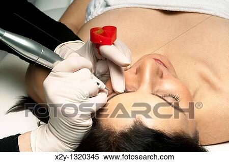 Micropigmentation procedure for the eyebrows, permanent make-up View Large Photo Image Stock Photography - Micropigmentation procedure for the eyebrows, permanent make-up. Fotosearch