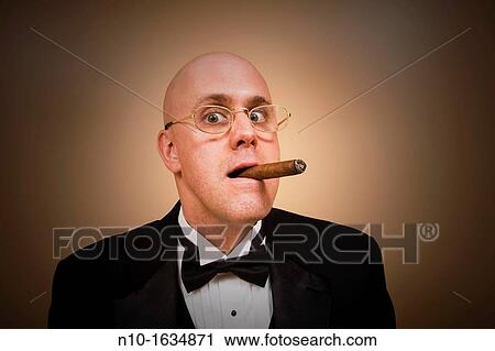 Middle-age bald man in a tuxedo, smoking a cigar View Large Photo Image Stock Image - Middle-age bald man in a tuxedo, smoking a cigar. Fotosearch