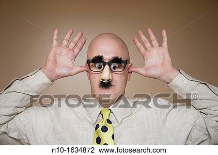 Middle-age bald man wearing funny glasses View Large Photo Image Stock Image - Middle-age bald man wearing funny glasses. Fotosearch