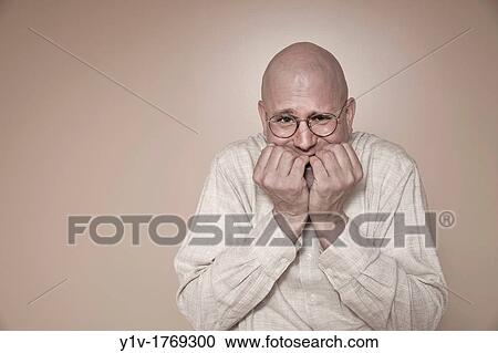 Middle-age bald man wearing glasses View Large Photo Image Stock Image - Middle-age bald man wearing glasses. Fotosearch
