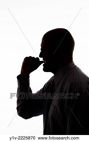 Stock Image - Middle-age bald man wearing glasses.. Fotosearch