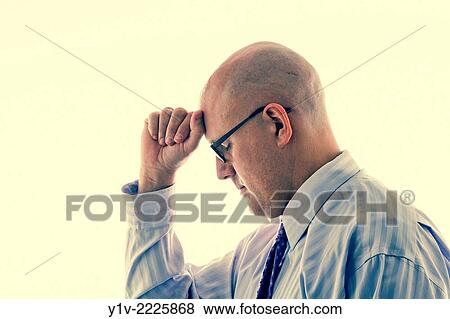 Stock Photo - Middle-age bald man wearing glasses.. Fotosearch