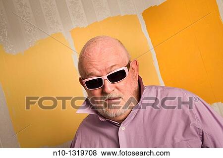 Middle-age balding man wearing sunglasses View Large Photo Image Stock Photo - Middle-age balding man wearing sunglasses. Fotosearch