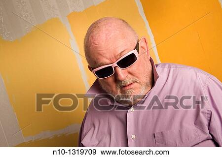 Middle-age balding man wearing sunglasses View Large Photo Image Stock Photo - Middle-age balding man wearing sunglasses. Fotosearch