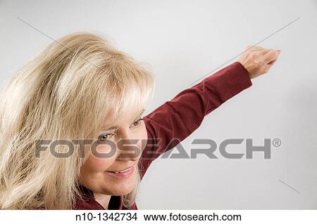 Middle-age blond woman View Large Photo Image Picture - Middle-age blond woman. Fotosearch