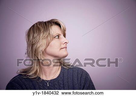 Stock Image - Middle-age blonde woman. Fotosearch