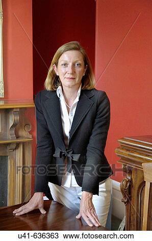 Stock Image - Middle age female executive. Fotosearch