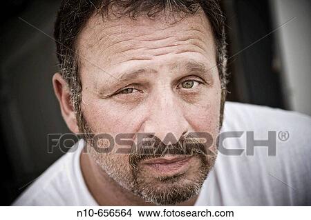 Middle-age man posing. View Large Photo Image Picture - Middle-age man posing.. Fotosearch
