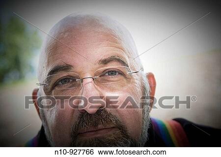 Middle-age man wearing glasses View Large Photo Image Stock Photograph - Middle-age man wearing glasses. Fotosearch