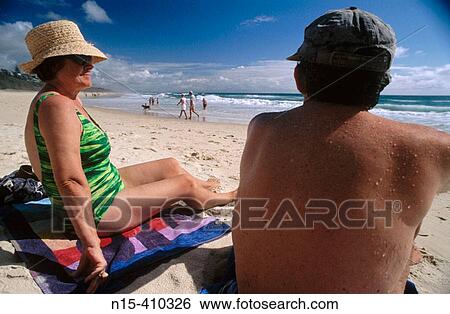 Middle-aged couple on the beach, Sunshine Beach, near Noosa, Sunshine Coast, Queensland, Australia View Large Photo Image Stock Photograph - Middle-aged couple on the beach, Sunshine Beach, near Noosa, Sunshine Coast, Queensland, Australia. Fotosearch