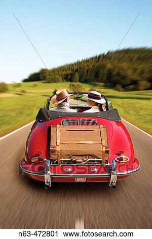 Middle aged couple on tour in a vintage Porsche in the, Black Forest, Germany View Large Photo Image Stock Image - Middle aged couple on tour in a vintage Porsche in the, Black Forest, Germany. Fotosearch