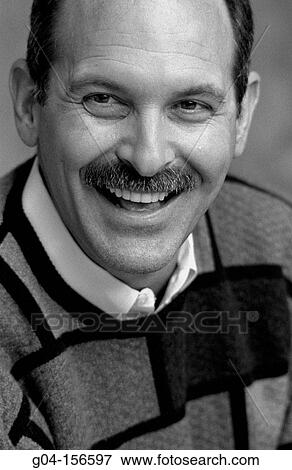 Middle-aged man smiling View Large Photo Image Stock Photo - Middle-aged man smiling. Fotosearch