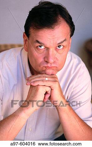 Middle aged man, strange expression View Large Photo Image Stock Photograph - Middle aged man, strange expression. Fotosearch