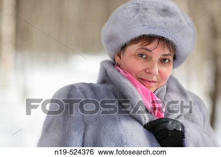 Middle aged woman in fur at winter, Russia View Large Photo Image Stock Photograph - Middle aged woman in fur at winter, Russia. Fotosearch