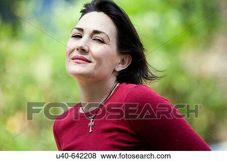 Middle aged woman View Large Photo Image Stock Photo - Middle aged woman. Fotosearch