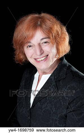 Middle aged woman with red hair looking happy View Large Photo Image Stock Photo - Middle aged woman with red hair looking happy. Fotosearch