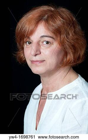 Middle aged woman with red hair smiling View Large Photo Image Stock Image - Middle aged woman with red hair smiling. Fotosearch