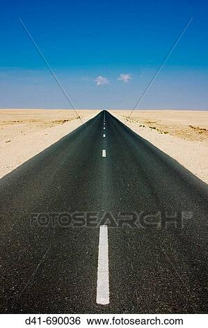 Middle east, Qatar, desert road View Large Photo Image Stock Photograph - Middle east, Qatar, desert road. Fotosearch