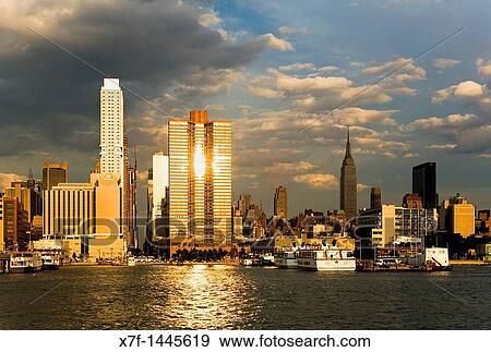 Stock Photo - Midtown, skyline of Manhattan across Hudson River from New Jersey, New York City, USA. Fotosearch