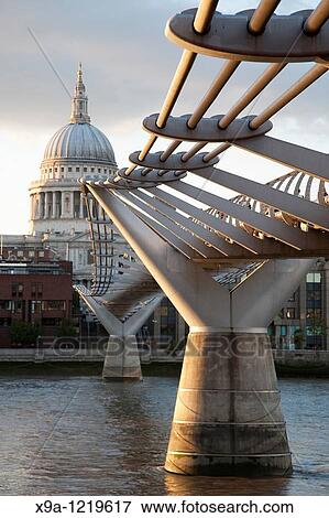 Milennium Bridge and St Pauls Cathedral on the River Thames in London View Large Photo Image Stock Photo - Milennium Bridge and St Pauls Cathedral on the River Thames in London. Fotosearch